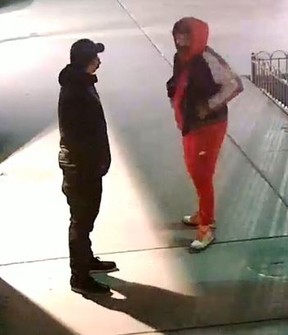 An image released by Toronto Police of two of three men sought in an April 3, 2022 break-and-enter at a commercial building at Queen and Spadina.