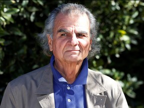 French fashion photographer Patrick Demarchelier poses at the first annual UNICEF Women of Compassion Luncheon in  Los Angeles, Calif., Feb. 11, 2011.