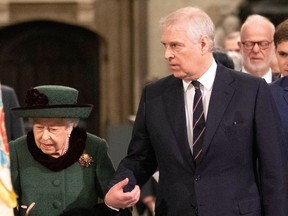 Queen Elizabeth II and Prince Andrew, Duke of York, arrive to attend a service of thanksgiving for Prince Philip, Duke of Edinburgh, at Westminster Abbey in central London on March 29, 2022.