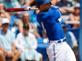 Toronto Blue Jays centre fielder George Springer (4) singles in the first inning against the New York Yankees during spring training at TD Ballpark.