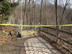 Toronto Police cordoned off the scene after a body was found in a creek in the Yonge St. and Heath St. E. area on Tuesday, April 5, 2022.