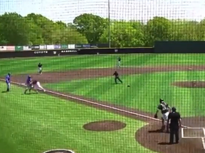 In this video still, North Central Texas College palyer Josh Phillips (in blue) steps off third base before he’s taken down to the ground by Weatherford College pitcher Owen Woodward (in black).