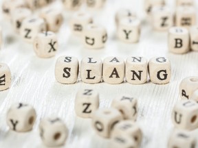 Slang word written on wood block.