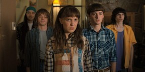 (L to R) Eduardo Franco as Argyle, Charlie Heaton as Jonathan, Millie Bobby Brown as Eleven, Noah Schnapp as Will Byers, and Finn Wolfhard as Mike Wheeler in Stranger Things.