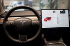 The inside of a Tesla car Model 3 is seen at a Tesla shop inside of a shopping Mall in Beijing on May 26, 2021.