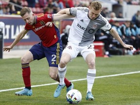 Real Salt Lake defender Andrew Brody (left) and Toronto FC forward Jacob Shaffelburg battle in the first half at Rio Tinto Stadium last night. Toronto FC played Real Salt Lake to a 2-2 draw.  USA TODAY Sports