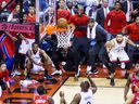 Kawhi Leonard watches as his game winning ball goes in, to clinch the series in Game 7, as the Toronto Raptors defeat the Philadelphia 76ers, in Toronto, Ont. on Sunday , May 13, 2019.