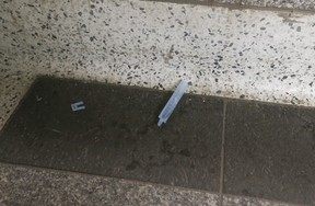 Remnants of needles spotted on the stairs at Wellesley station at the rear entrance to Dundonald St. where vagrancy and homelessness abounds on Friday, April 22, 2022.