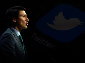 Canadian Prime Minister Justin Trudeau and Twitter logo. Toronto Sun photo illustration. Photographty/Canadian Press.