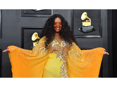 US singer H.E.R. arrives for the 64th Annual Grammy Awards at the MGM Grand Garden Arena in Las Vegas on April 3, 2022. (Photo by ANGELA  WEISS / AFP)