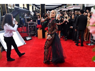 British singer Rita Ora arrives for the 64th Annual Grammy Awards at the MGM Grand Garden Arena in Las Vegas on April 3, 2022. (Photo by ANGELA  WEISS / AFP)