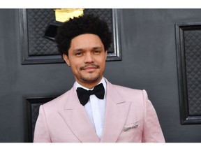 South African comedian Trevor Noah arrives for the 64th Annual Grammy Awards at the MGM Grand Garden Arena in Las Vegas on April 3, 2022. (Photo by ANGELA WEISS / AFP)