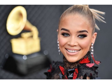 British singer Rita Ora arrives for the 64th Annual Grammy Awards at the MGM Grand Garden Arena in Las Vegas on April 3, 2022. (Photo by ANGELA WEISS / AFP)