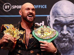 World Boxing Council (WBC) heavyweight title holder Britain's Tyson Fury takes part in an pre-fight press conference at Wembley Stadium in west London, on April 20, 2022.