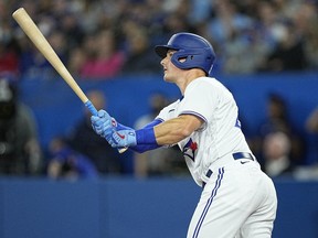 Toronto Blue Jays third baseman Matt Chapman hits a three run homerun against the Texas Rangers during the first inning at Rogers Centre.
