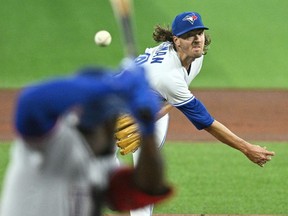 Toronto Blue Jays starting pitcher Kevin Gausman delivers a pitch against the Texas Rangers in the first inning at Rogers Centre.