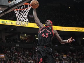 Toronto Raptors forward Pascal Siakam (43) goes to dunk the ball against the Houston Rockets during the second half at Scotiabank Arena.