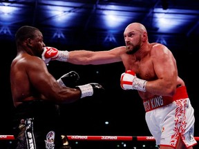 Boxing - Tyson Fury v Dillian Whyte - WBC World Heavyweight Title - Wembley Stadium, London, Britain - April 23, 2022 . Tyson Fury in action against Dillian Whyte.