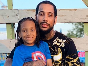 Marcus Spain and his son. He was murdered in March 2021 and his alleged killers were arrested just before Christmas. Buffalo is dealing with a spike in homicides.
