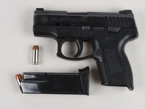 A handgun allegedly seized from an accused carjacker.