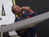 Dave Portnoy taking a bite from Maker Pizza in Toronto.