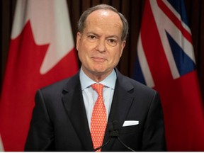 Ontario Finance Minister Peter Bethlenfalvy takes to the podium during a news conference in Toronto on April 28, 2021.s