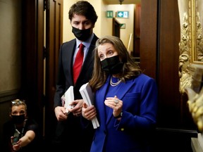 Canada's Finance Minister Chrystia Freeland and Prime Minister Justin Trudeau speak to the media before delivering the 2022-23 budget, on Parliament Hill in Ottawa, Ontario, Canada, April 7, 2022.