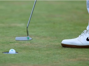 Jul 19, 2020; Dublin, Ohio, USA; A view of the logo on the putter of Tony Finau as he putts on the 18th green during the final round of The Memorial Tournament at Muirfield Village Golf Club.
