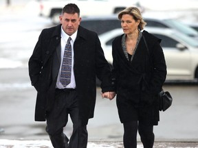 Former Canadian Gymnastics coach Dave Brubaker arrives at the courthouse with his wife Elizabeth Brubaker in Sarnia, Ont, on Wednesday, Feb. 13, 2019.