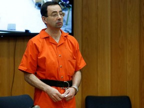 Larry Nassar, a former team USA Gymnastics doctor who pleaded guilty in November 2017 to sexual assault charges, stands in court during his sentencing hearing in the Eaton County Court in Charlotte, Michigan, U.S., February 5, 2018.