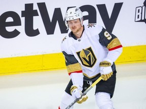 Vegas Golden Knights center Jack Eichel skates with the puck during the warmup period against the Calgary Flames at Scotiabank Saddledome.