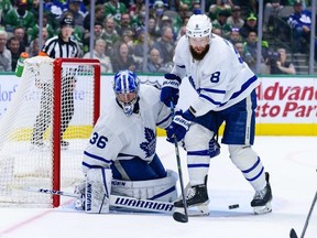 Apr 7, 2022; Dallas, Texas, USA; Toronto Maple Leafs goaltender Jack Campbell and defenseman Jake Muzzin defend against the Dallas Stars attack during the second period at the American Airlines Center.