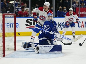 Toronto Maple Leafs goaltender Erik Kallgren allows a goal by Montreal Canadiens forward Cole Caufield (not pictured) Canadiens forward Christian Dvorak and forward Brendan Gallagher look on during the second period at Scotiabank Arena.