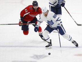 Apr 24, 2022; Washington, District of Columbia, USA; Toronto Maple Leafs right wing William Nylander (88) skates with the puck as Washington Capitals right wing Tom Wilson (43) chases in the third period at Capital One Arena.