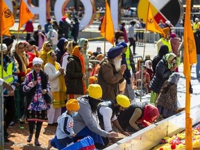 Members of the Sikh community mark  Khalsa Day, organized by Ontario Sikhs and Gurdwaras Council (OSGC), at Nathan Phillips Square on April 24, 2022.