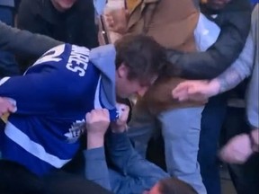 It kicks off. A Leafs fan in a Tavares jersey pummels another fan he accused of groping a woman.