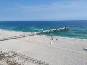 The Gulf of Mexico and its amazing beach is seen from my room at the Best Western Premier The Tides in Orange Beach, Ala.