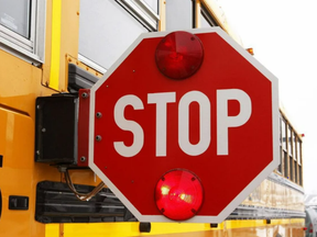 Stop sign on a school bus.