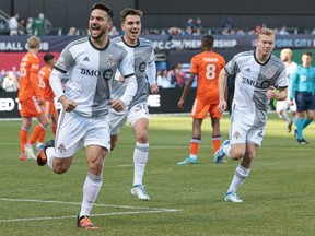 Apr 24, 2022; New York, NY, New York, NY, USA; Toronto FC forward Jesus Jimenez (9) celebrates his goal with teammates during the first half against New York City FC at Citi Field.