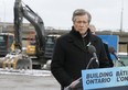 Mayor John Tory is pictured at a March 27, 2022 press conference about construction of the new Ontario subway line.