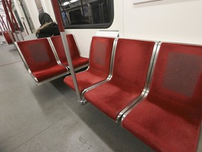 The TTC says it is going to cost a lot of money and cleaning supplies to remove the glue marks from seats where COVID stickers once were located to dissuade commuters from sitting close to each other, as seen here on Friday, April 22, 2022.