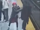 In this screengrab taken from video posted by BlogTO, a woman is shoved onto the subway tracks at Bloor-Yonge Station on Sunday, April 17, 2022. The victim survived.