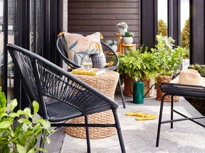 Small scale and open-air-style furnishings are perfect for small outdoor spaces. Black Outdoor Conversation Chair, $99, www.winners.ca
