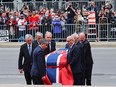 Pallbearers carry Guy Lafleur’s body into Mary Queen of the World Cathedral for his funeral in Montreal on May 3, 2022.