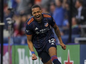 FC Cincinnati forward Calvin Harris celebrates after scoring a goal against Toronto FC in the first half at TQL Stadium.