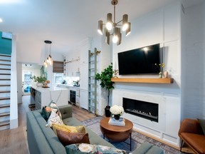 A sleek, bright kitchen and comfortable seating area make the best use of this skinny 800 sq. ft. home that Chrissy Newton refers to as a "condo house."