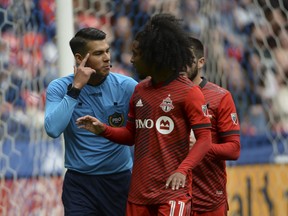 Toronto FC forward Jayden Nelson (11) speaks with referee Victor Rivas during the second half at BC Place.