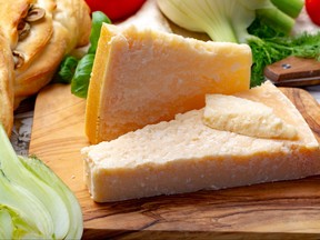 Pieces of Parmigiano-Reggiano close up. Files