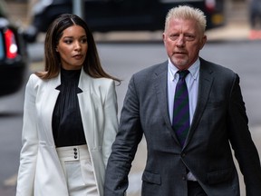 Boris Becker on the right arrived in court with his girlfriend Lillian de Calvalho Monteiro at the Southern Borough Crown Court on April 29, 2022 in London, England.