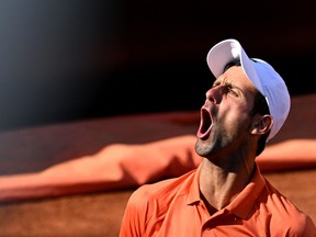 Serbia's Novak Djokovic celebrates winning a game during the final match of the Men's ATP Rome Open tennis tournament against Greece's Stefanos Tsitsipas on May 15, 2022 at Foro Italico in Rome.